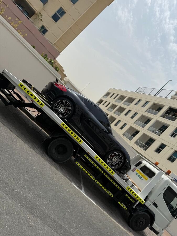 Black Porsche transport Dubai street