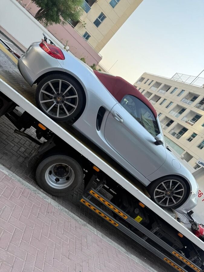 Porsche Boxster on recovery truck